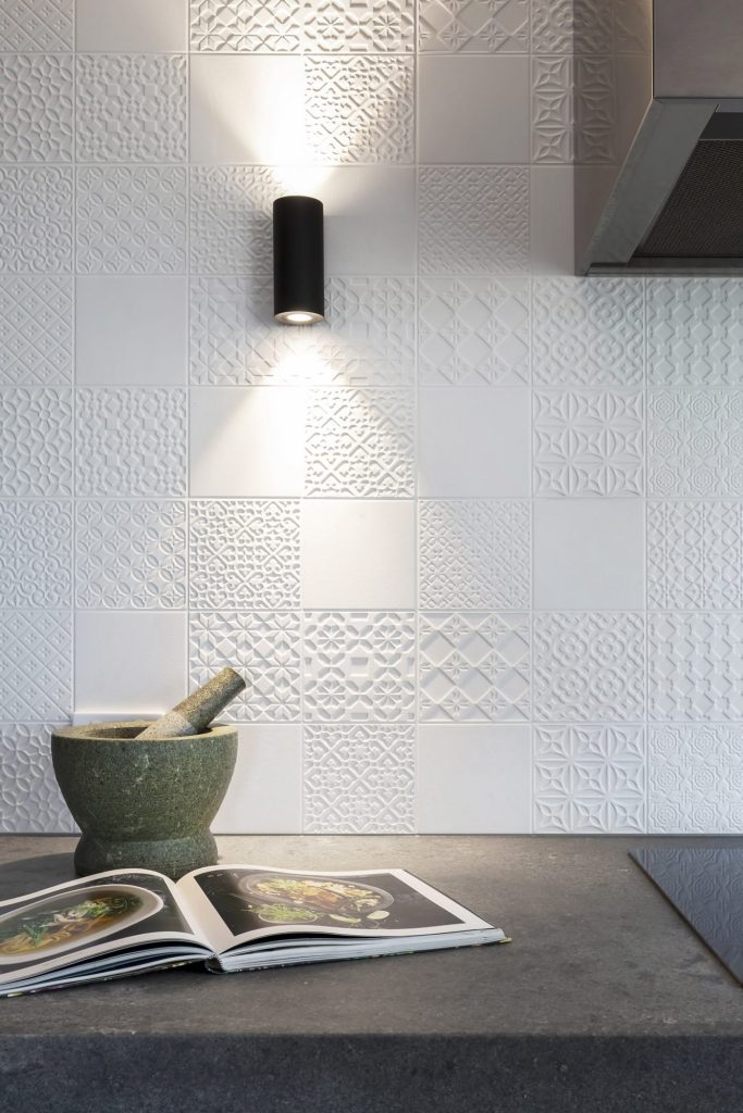 Sconce on Splashback of a textured tile