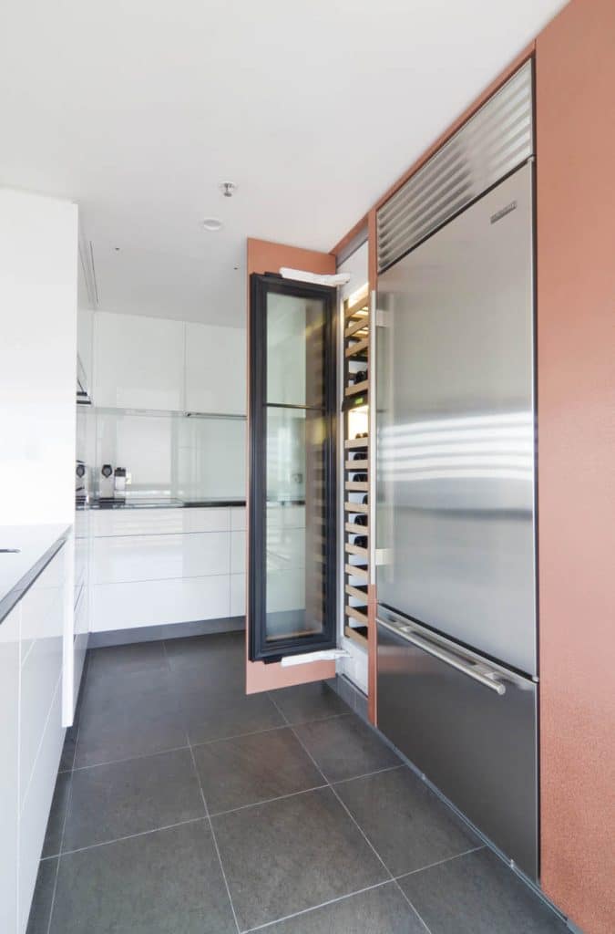 A very tight fit for this freestanding Subzero refrigerator and built in wine fridge